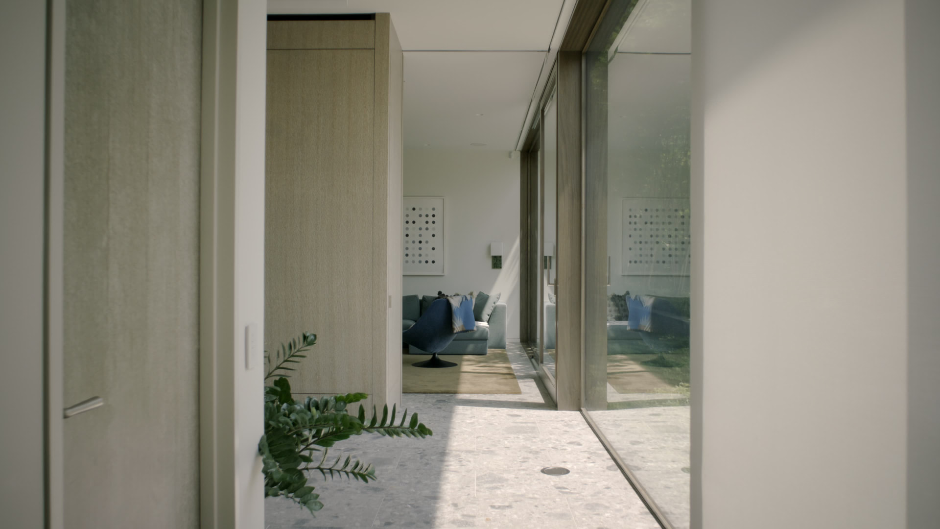 Bedford Quarry — Hallway with terrazzo floor looking through to the living room